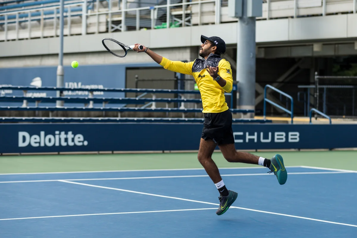 Mehul playing tennis
