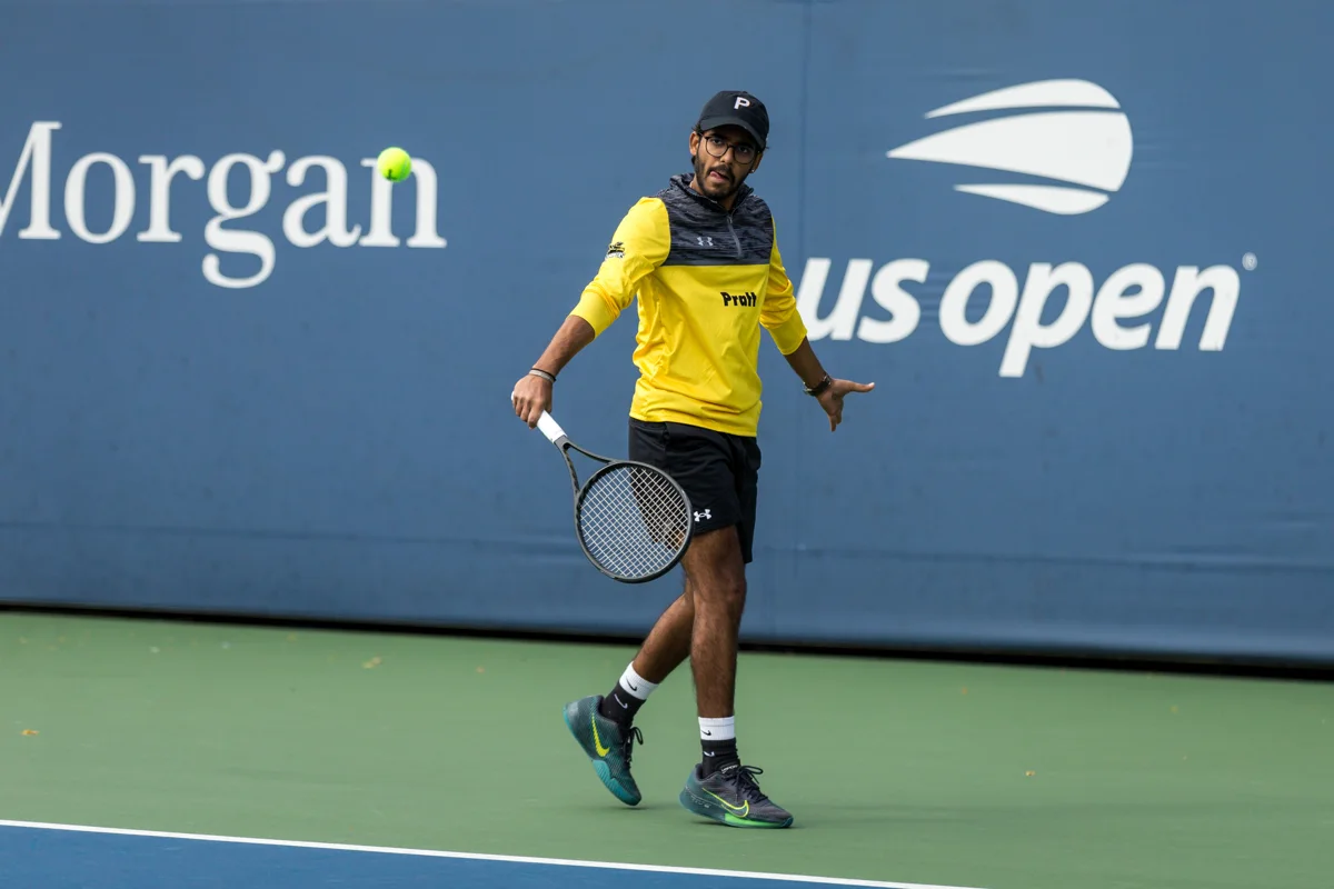 Mehul playing tennis