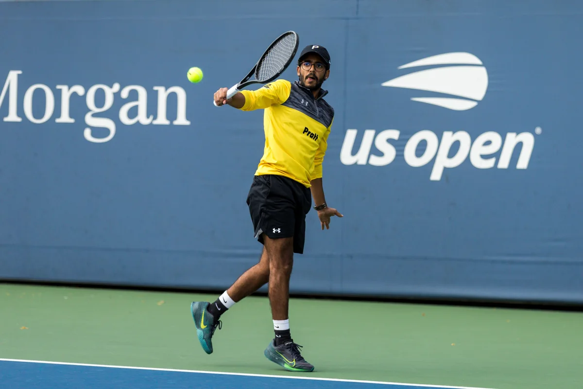Mehul playing tennis