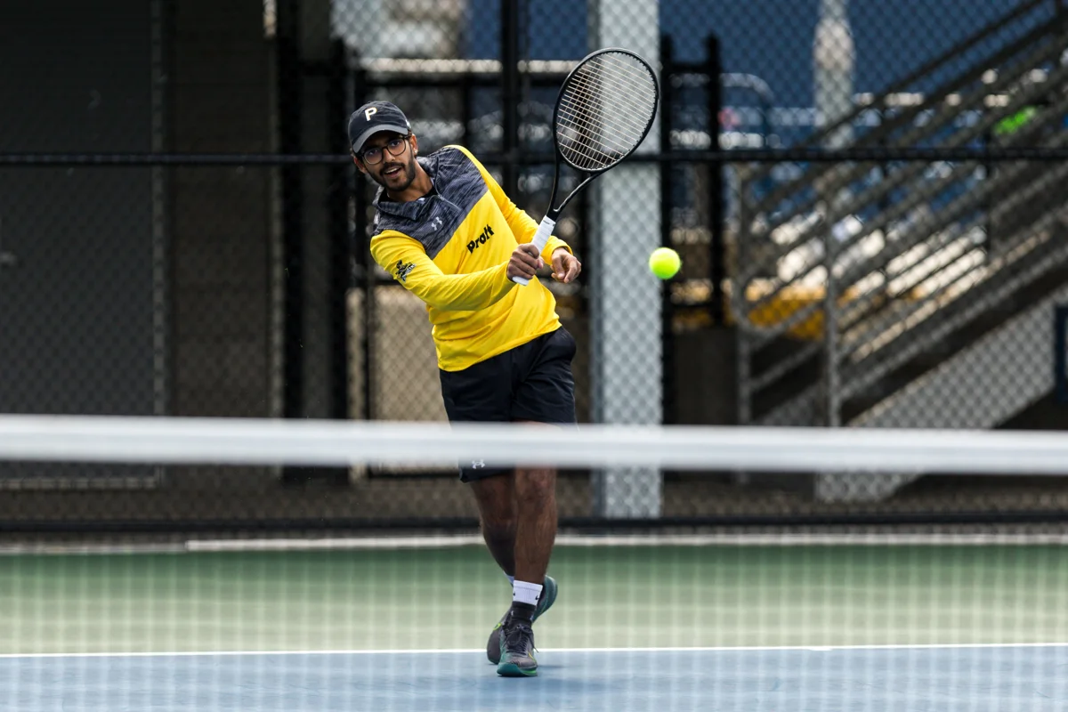 Mehul playing tennis