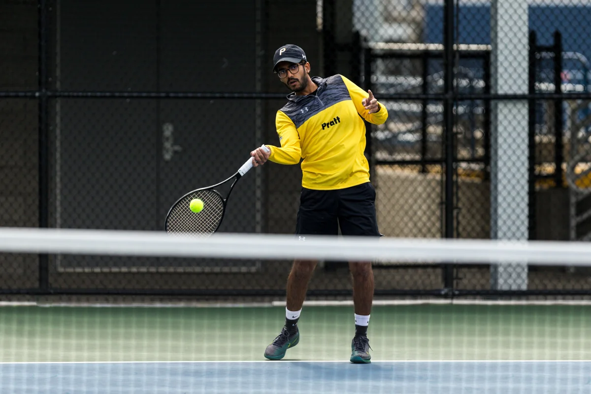 Mehul playing tennis