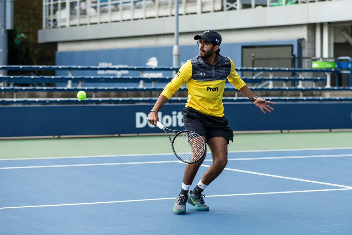 Mehul playing tennis