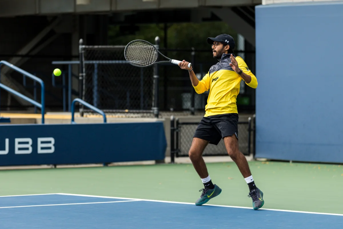 Mehul playing tennis